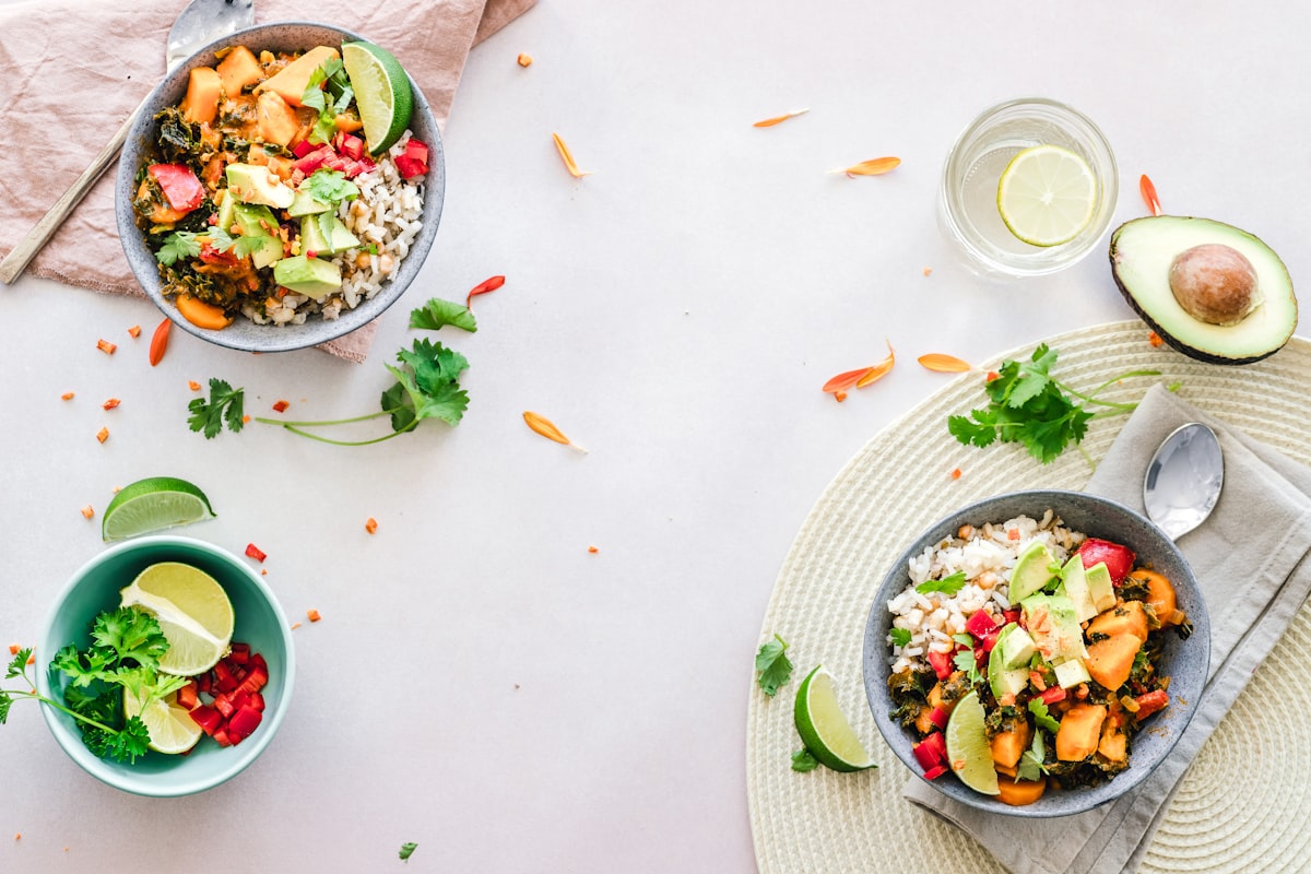 Fresh salad with mixed greens, nuts, and tahini dressing